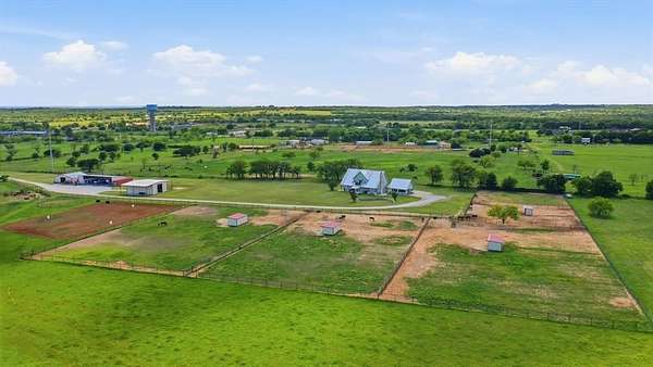 54.2 Acres of Agricultural Land with Home for Sale in Granbury, Texas
