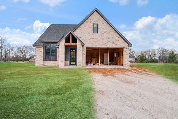 1.88 Acres of Land with Home for Sale in Blossom, Texas