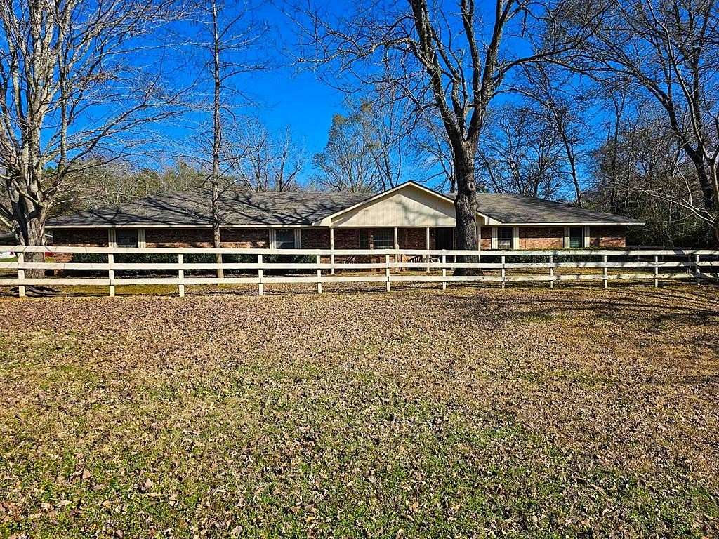 7.58 Acres of Land with Home for Sale in Palestine, Texas