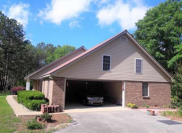9.3 Acres of Land with Home for Sale in Opelika, Alabama
