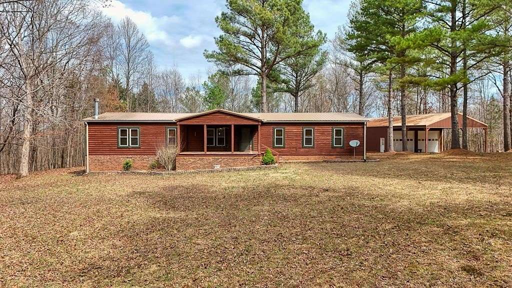 23.6 Acres of Land with Home for Sale in Springville, Tennessee