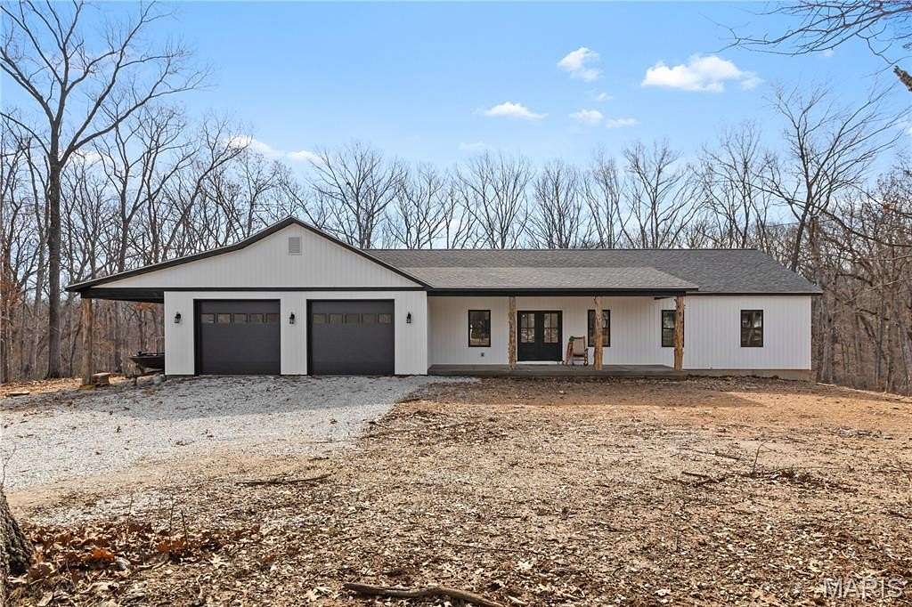 3.7 Acres of Land with Home for Sale in Hawk Point, Missouri