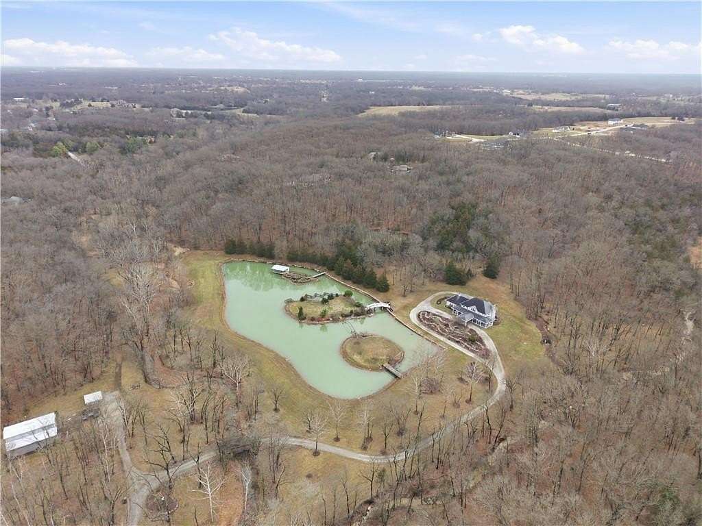 25.8 Acres of Recreational Land with Home for Sale in Columbia, Missouri