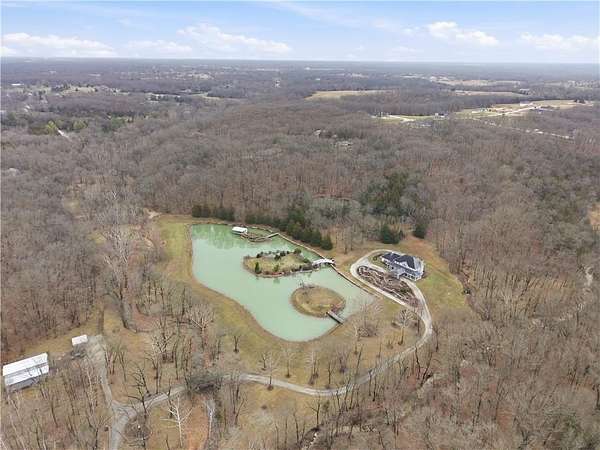 25.8 Acres of Recreational Land with Home for Sale in Columbia, Missouri