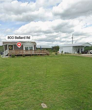 1.89 Acres of Land with Home for Sale in Camden, Tennessee