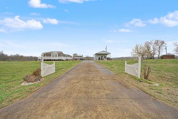 1.89 Acres of Land with Home for Sale in Camden, Tennessee