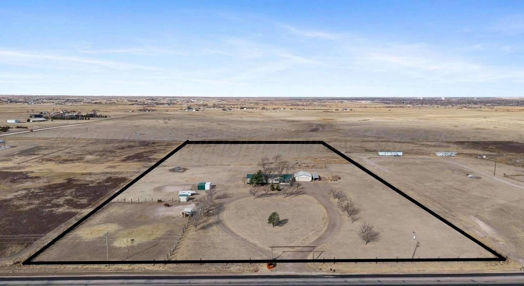 10 Acres of Land with Home for Sale in Canyon, Texas