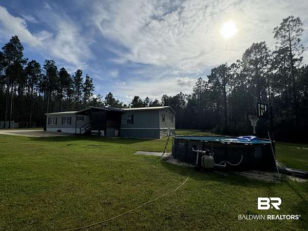 30 Acres of Land with Home for Sale in Bay Minette, Alabama