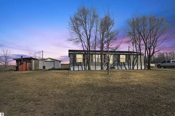 4.24 Acres of Land with Home for Sale in Evart, Michigan