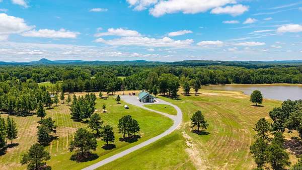71 Acres of Recreational Land with Home for Sale in Roland, Arkansas