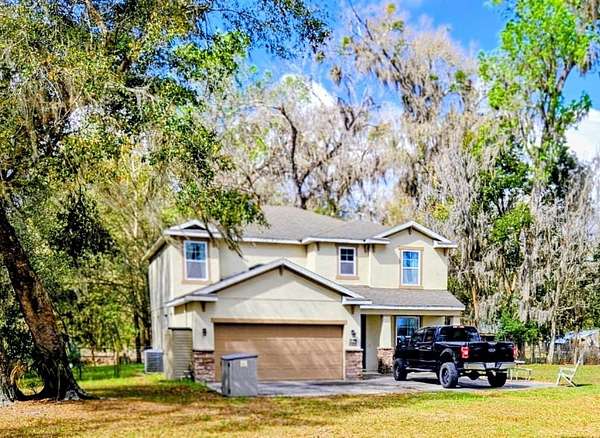 10.6 Acres of Land with Home for Sale in Seville, Florida
