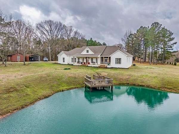 25.3 Acres of Land with Home for Sale in Holly Springs, Mississippi