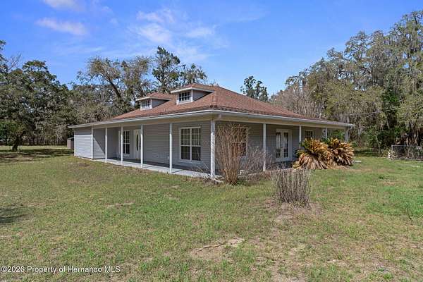 4.7 Acres of Land with Home for Sale in Brooksville, Florida