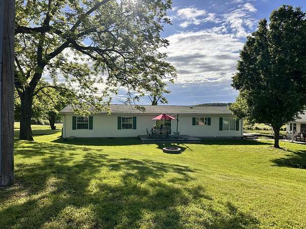 80 Acres of Land with Home for Sale in Kissee Mills, Missouri