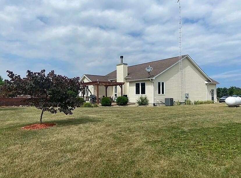 6 Acres of Land with Home for Sale in Grant Township, Michigan