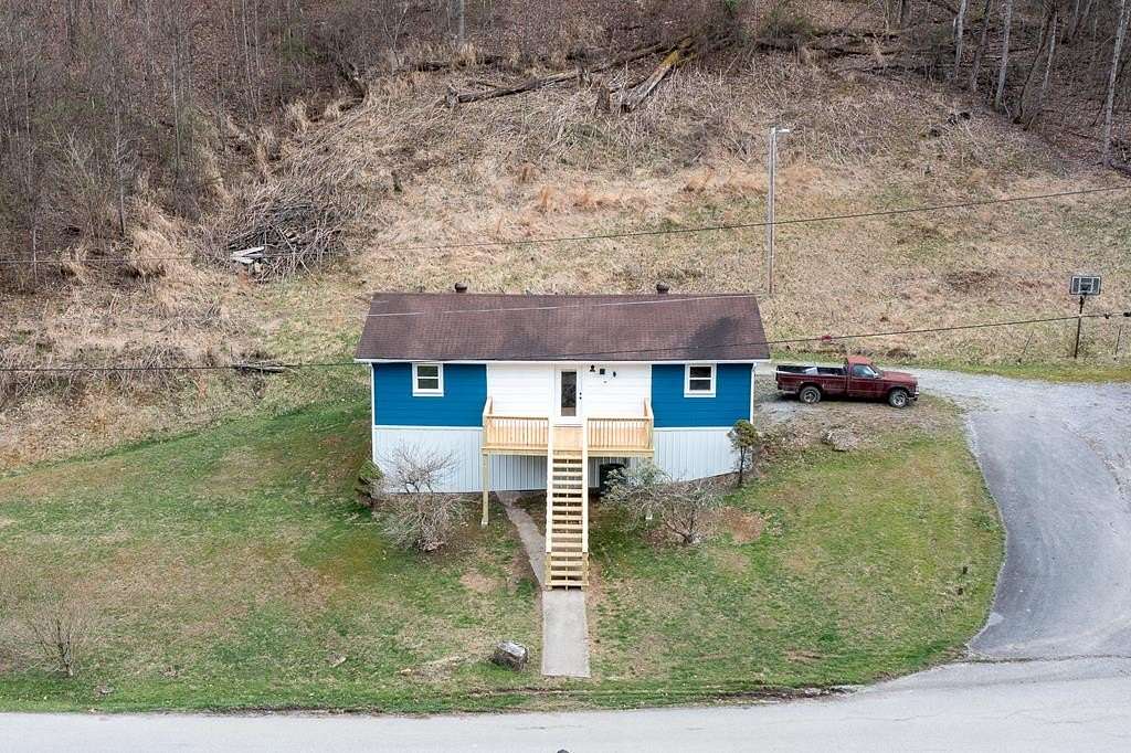9.3 Acres of Land with Home for Sale in Busy, Kentucky
