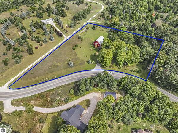 4 Acres of Land with Home for Sale in Traverse City, Michigan