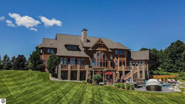 9.38 Acres of Land with Home for Sale in Williamsburg, Michigan