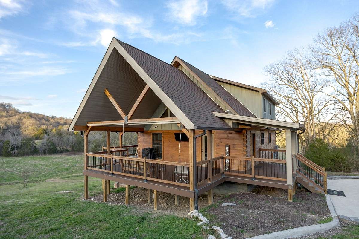 183 Acres of Recreational Land with Home for Sale in Dellrose, Tennessee