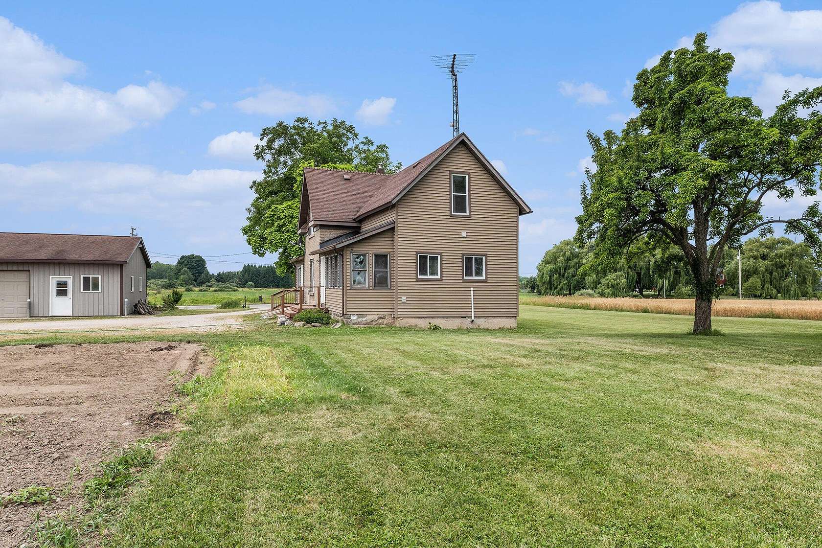 4.14 Acres of Land with Home for Sale in Free Soil, Michigan