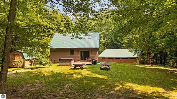 20 Acres of Recreational Land with Home for Sale in Thompsonville, Michigan