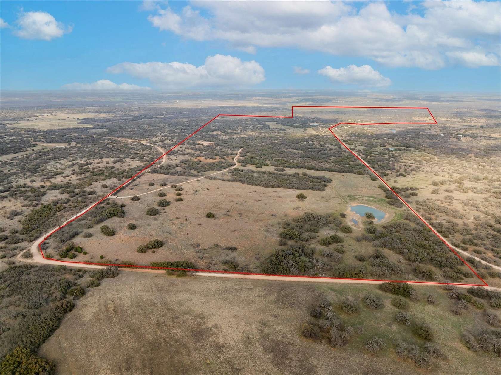 605 Acres of Recreational Land with Home for Sale in Mullin, Texas