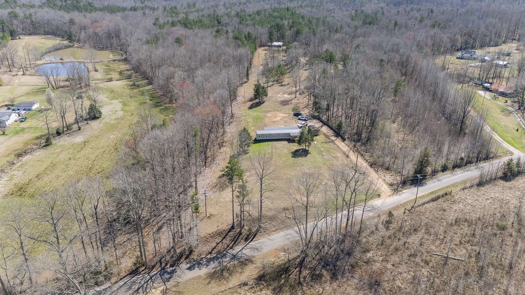 71 Acres of Recreational Land with Home for Sale in Selmer, Tennessee
