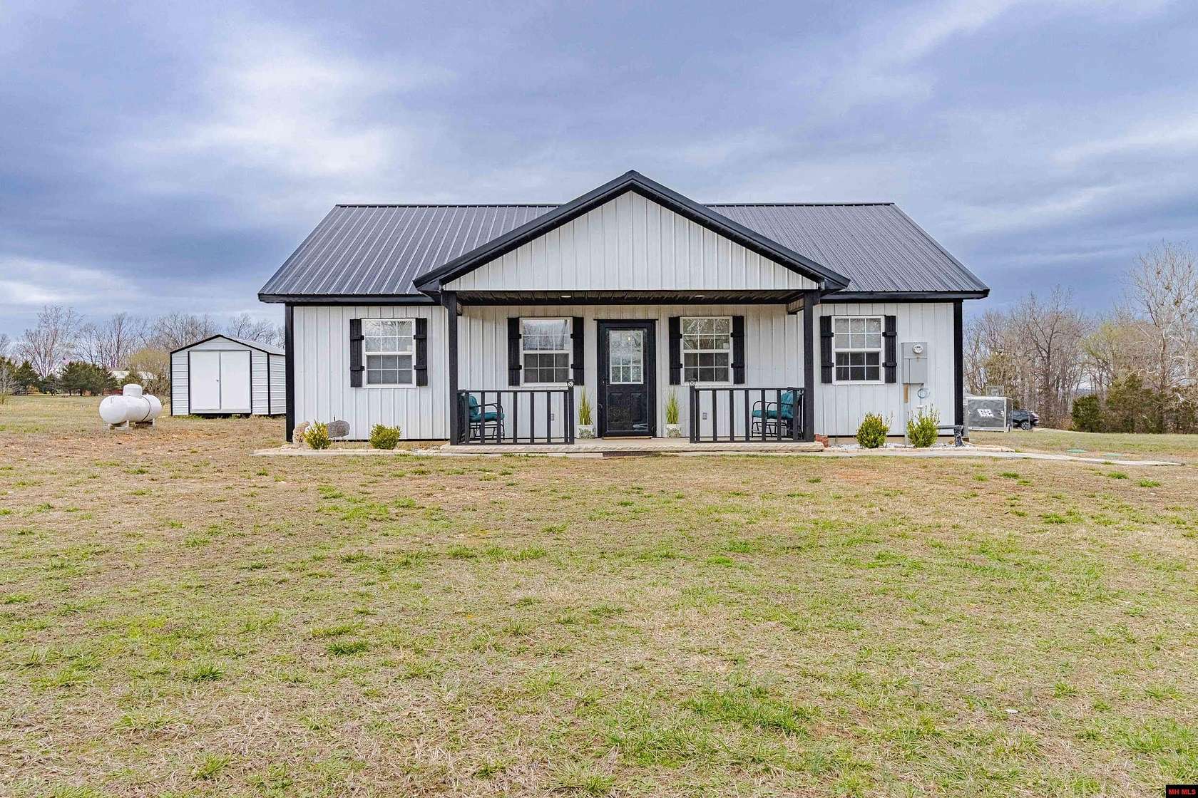 2.18 Acres of Land with Home for Sale in Flippin, Arkansas