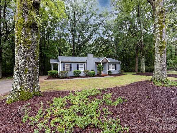 5 Acres of Land with Home for Sale in Matthews, North Carolina