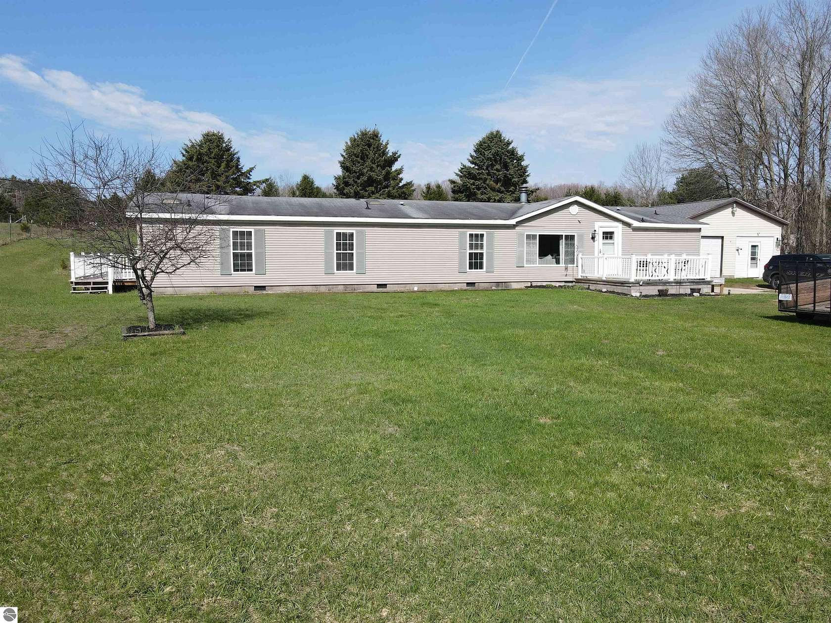 5 Acres of Land with Home for Sale in East Jordan, Michigan