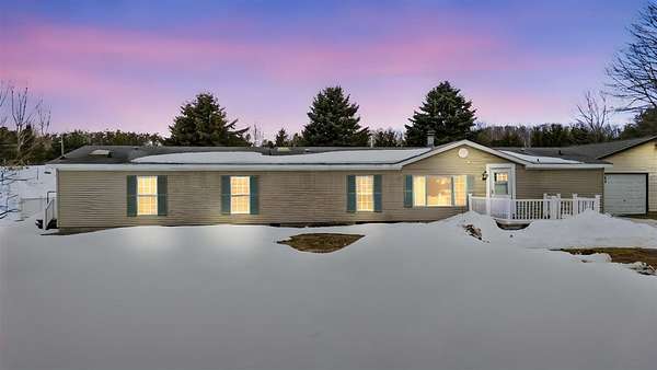 5 Acres of Land with Home for Sale in East Jordan, Michigan