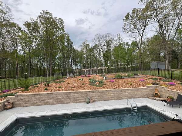 1.55 Acres of Land with Home for Sale in Palmyra, Tennessee