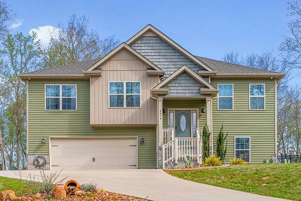 1.55 Acres of Land with Home for Sale in Palmyra, Tennessee