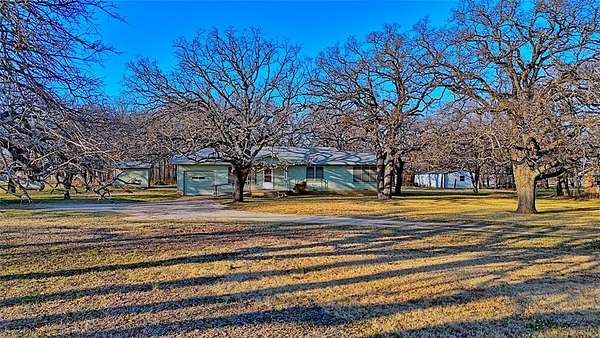 2 Acres of Land with Home for Sale in Paradise, Texas