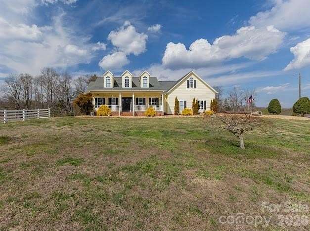 33.9 Acres of Agricultural Land with Home for Sale in Hudson, North Carolina