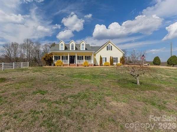 33.9 Acres of Agricultural Land with Home for Sale in Hudson, North Carolina
