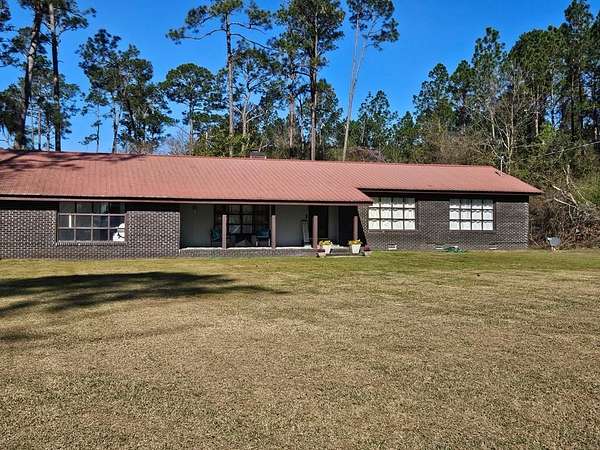 2.6 Acres of Land with Home for Sale in Nashville, Georgia