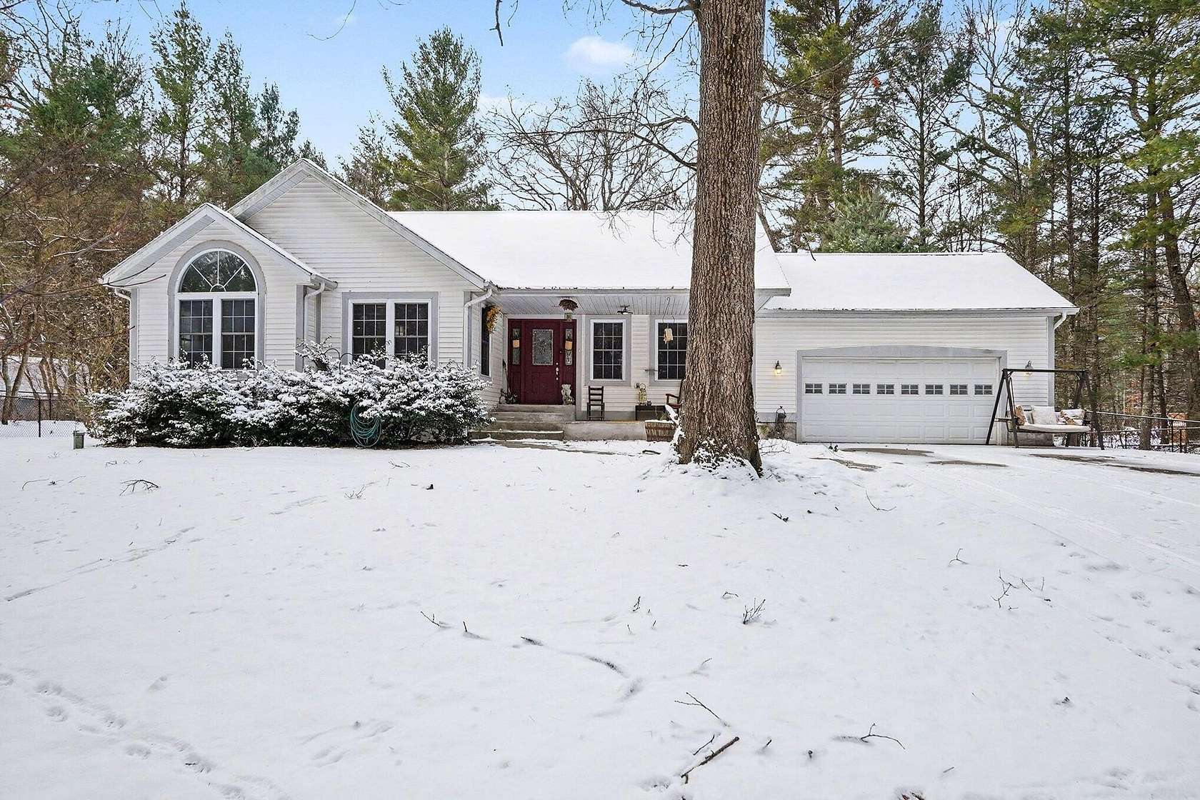 2 Acres of Land with Home for Sale in Twin Lake, Michigan