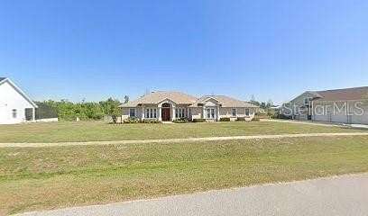 2.48 Acres of Land with Home for Sale in Dover, Florida