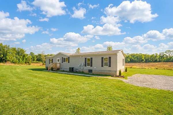 1.5 Acres of Land with Home for Sale in Chapmansboro, Tennessee