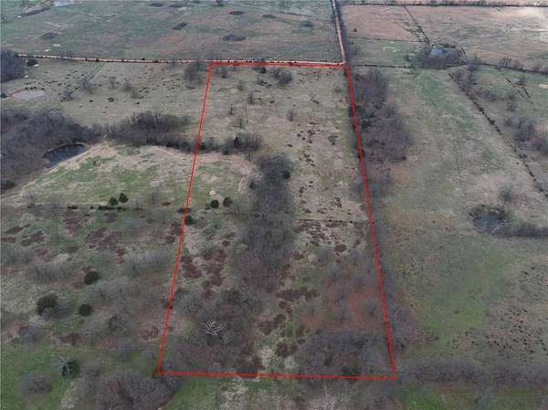 25 Acres of Land for Sale in Gravette, Arkansas