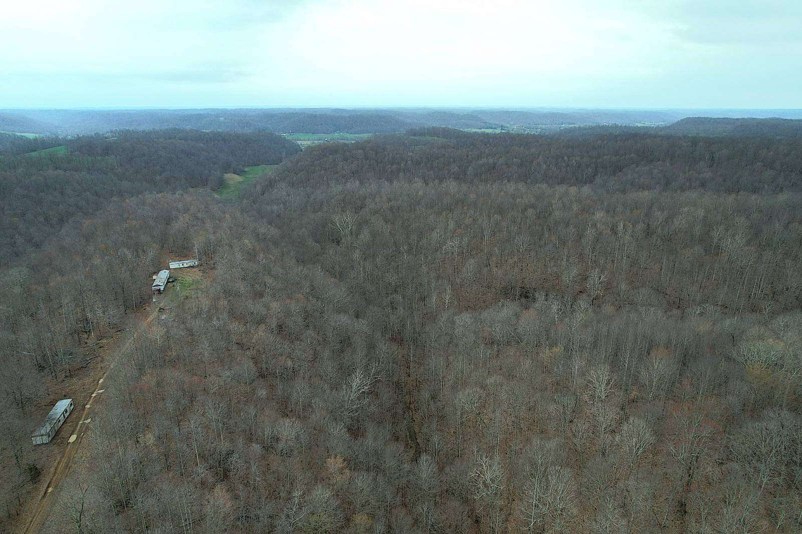 78.5 Acres of Recreational Land with Home for Sale in Liberty, Kentucky