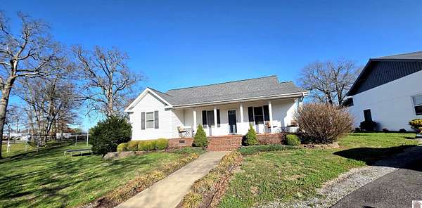 9.5 Acres of Land with Home for Sale in Murray, Kentucky