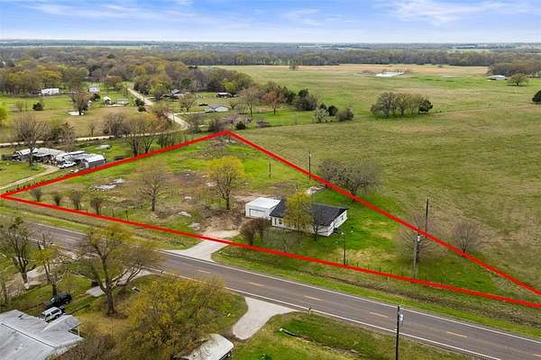2 Acres of Land with Home for Sale in Terrell, Texas