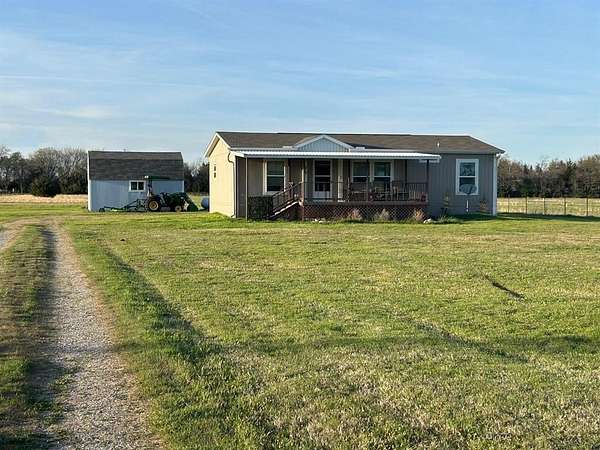 3 Acres of Land with Home for Sale in Savoy, Texas