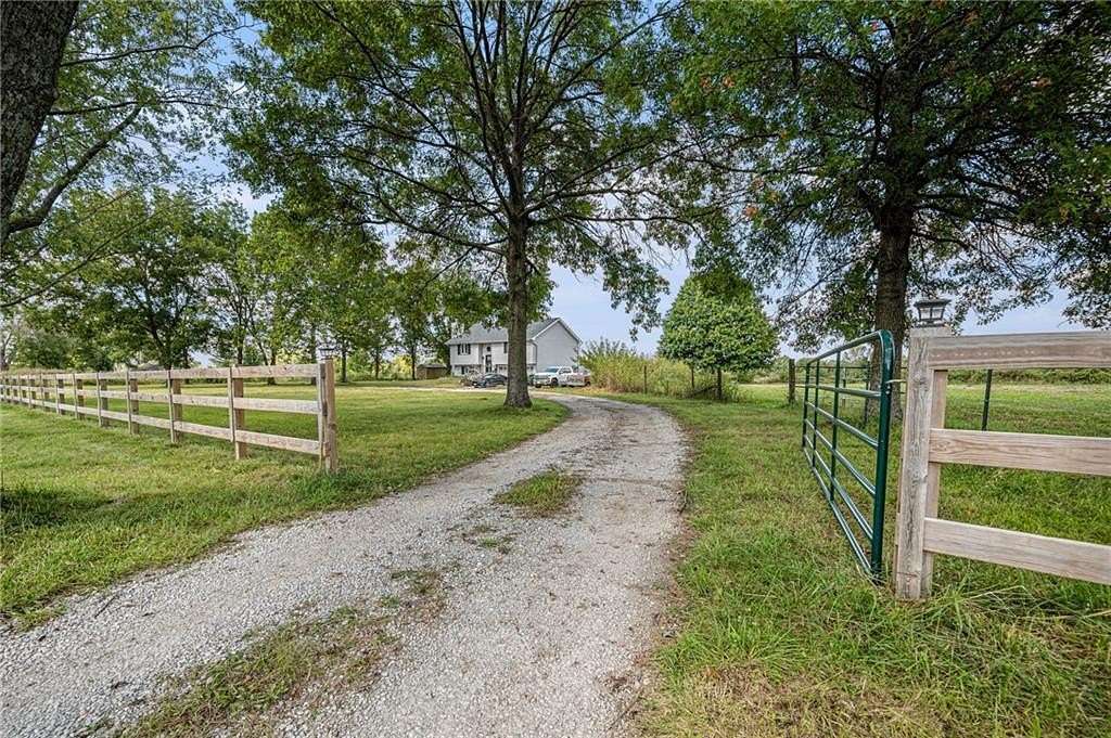 10 Acres of Land with Home for Sale in Peculiar, Missouri