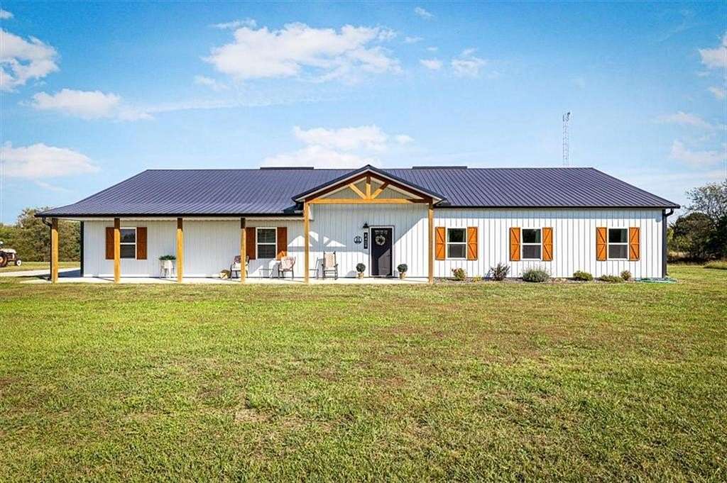 10 Acres of Land with Home for Sale in Odessa, Missouri