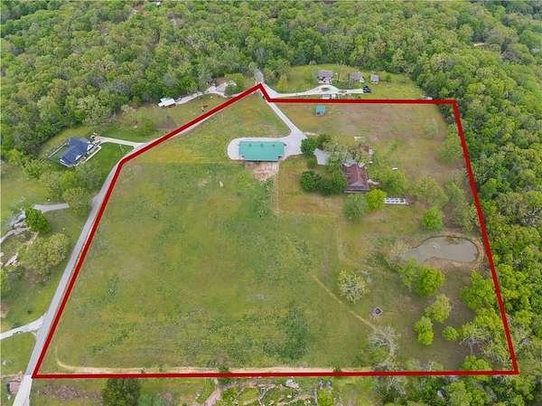 9.68 Acres of Land with Home for Sale in Garfield, Arkansas