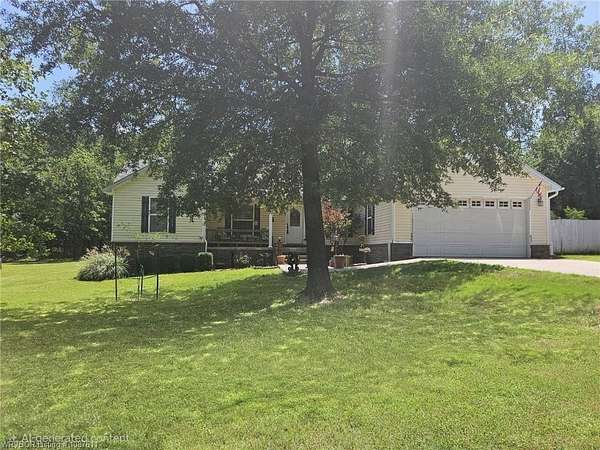 1.5 Acres of Land with Home for Sale in Bonanza, Arkansas