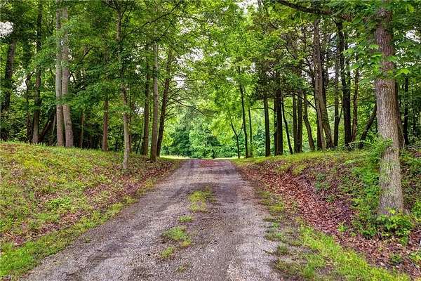 20.8 Acres of Land with Home for Sale in Spring Grove, Virginia